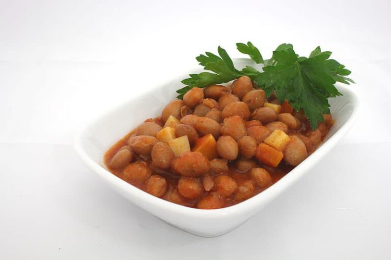 chickpea soup with mint in white dish