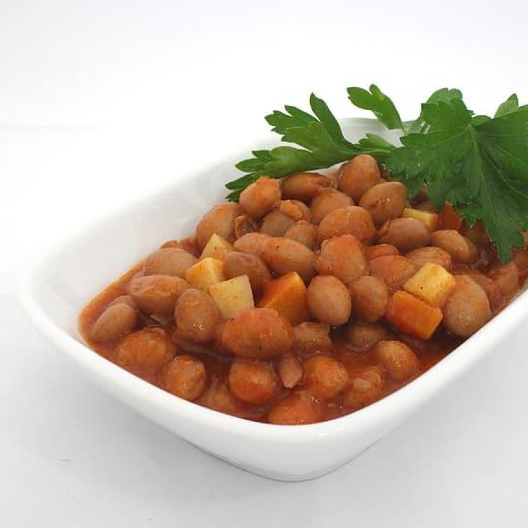 chickpea soup with mint in white dish